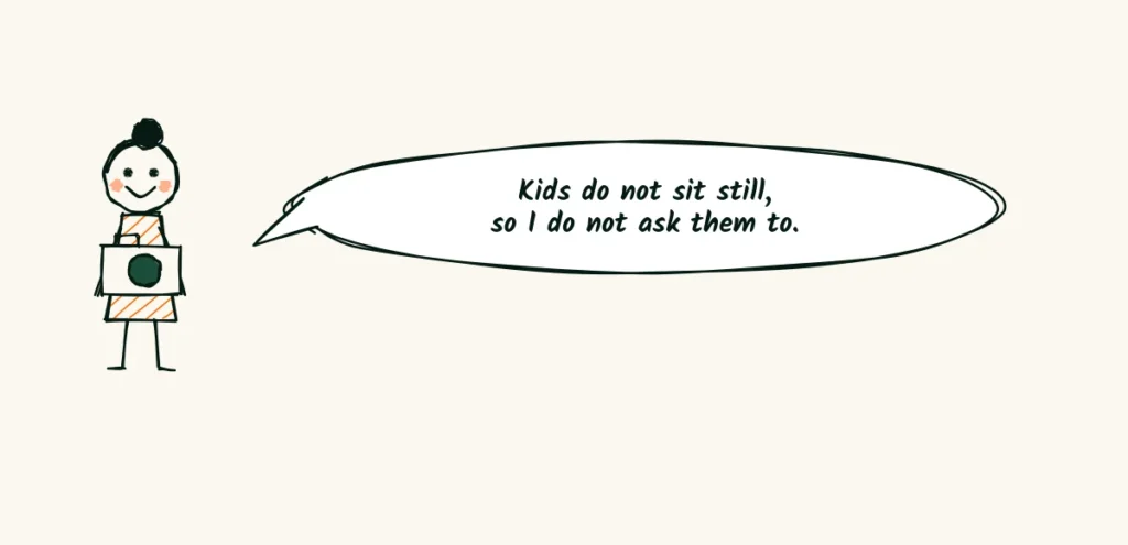 A quote in kitchen-table voice A doodle of a photographer holding a camera with a speech bubble that says kids do not sit still so I do not ask them to