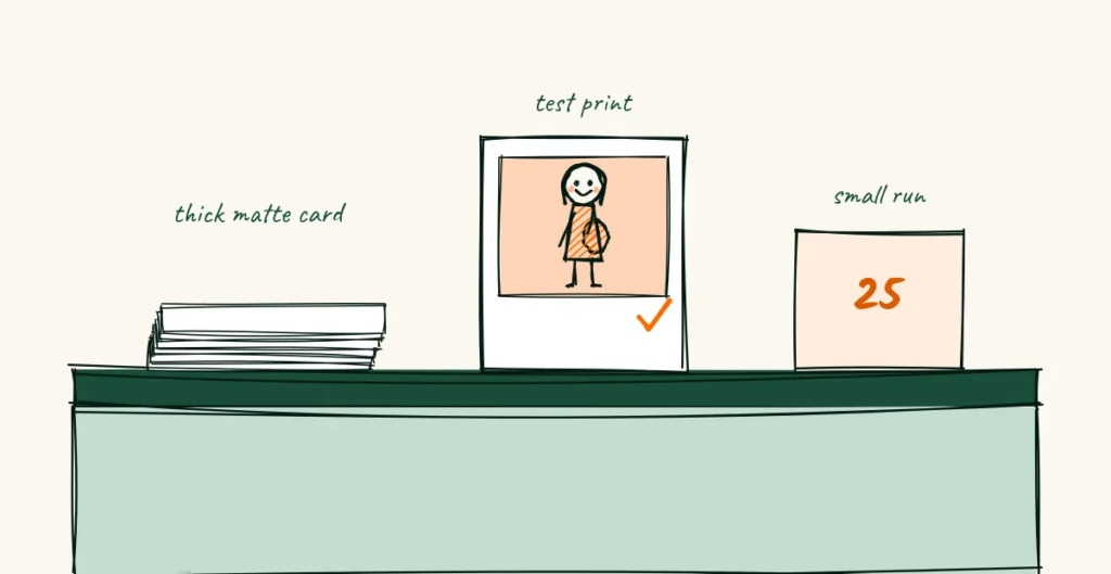 Print it so it feels good A doodle print shop counter with a stack of thick matte card, a test print with a check mark for skin tones and a small box of 25 flyers